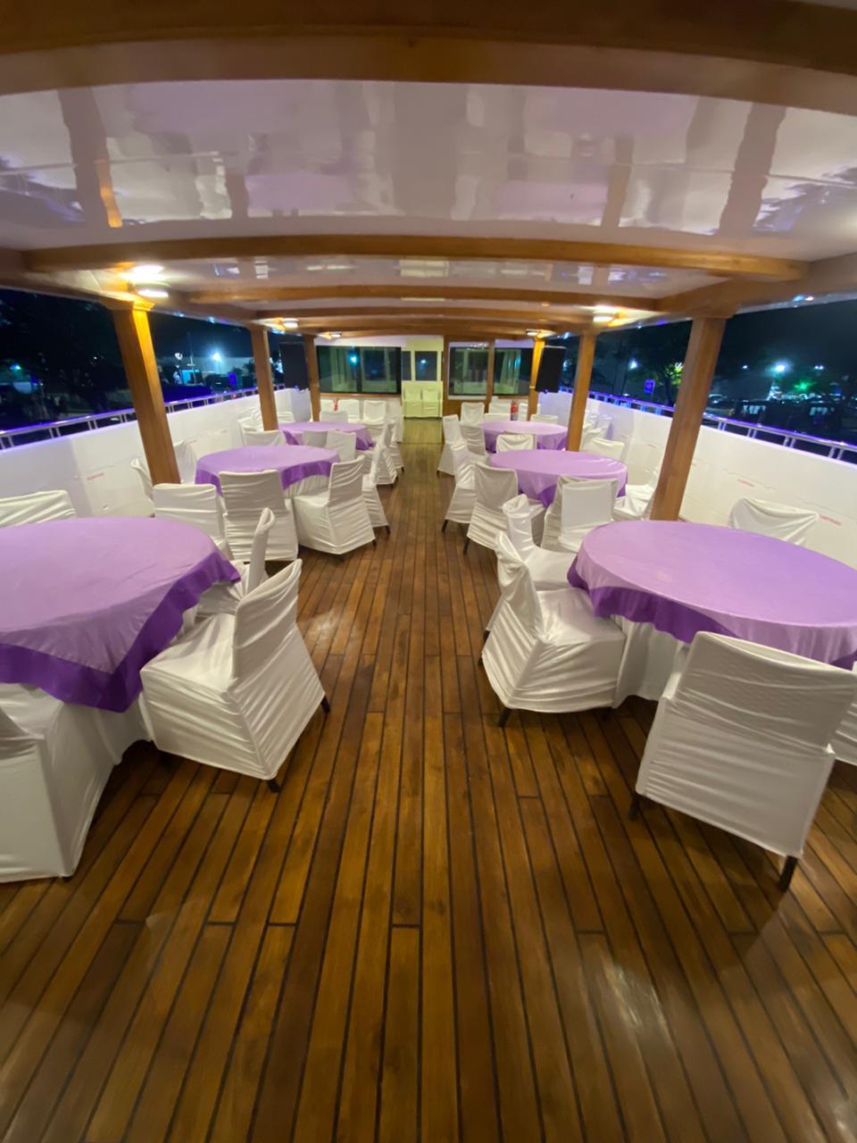 Wedding reception decorated tables on Minar Cruise at Marine Drive, Kochi