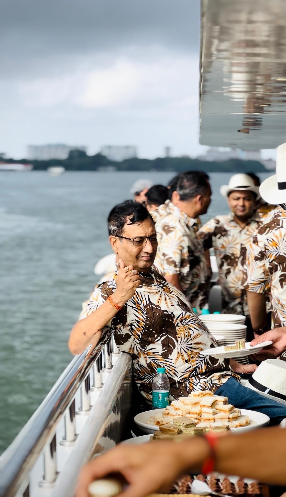 Corporate team enjoying a productive meeting aboard Minar Cruise, Kerala