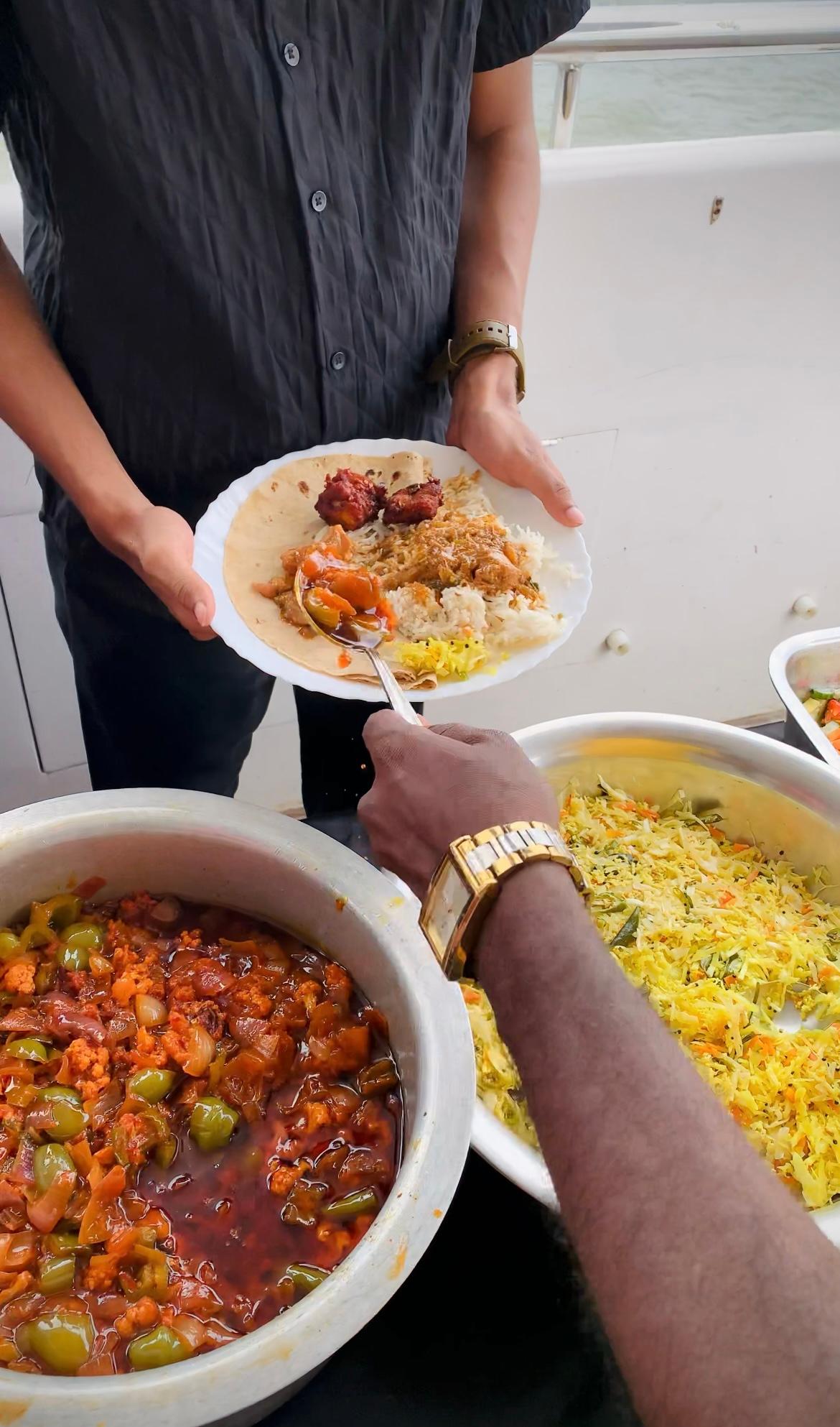 Gourmet seafood Luch served as families enjoy a sunset cruise on Minar Cruise