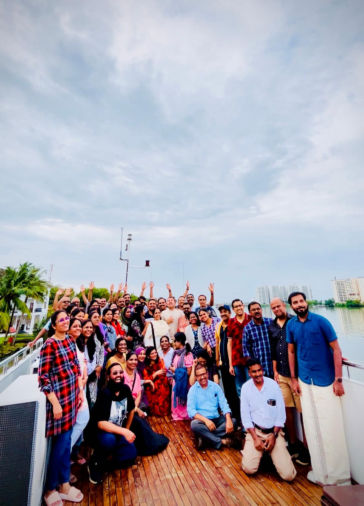 Friends enjoying a weekend party on Minar Cruise under the Kerala sky