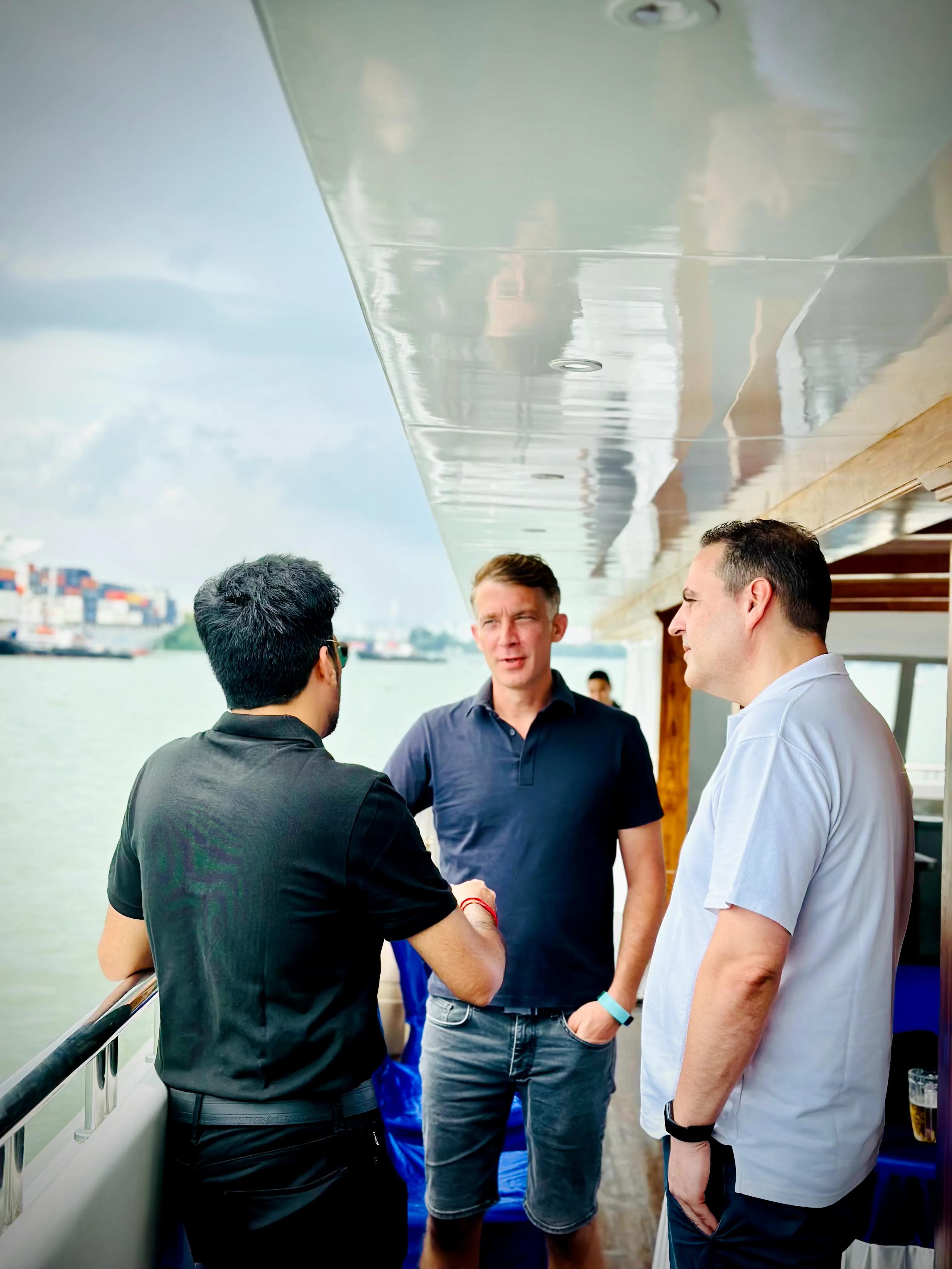 A group of people enjoying a scenic cruise on the Minar Cruise, the 1st private catamaran sea cruise registered under the Indian Register of Shipping in Kerala. Enjoy the beauty of Kochi