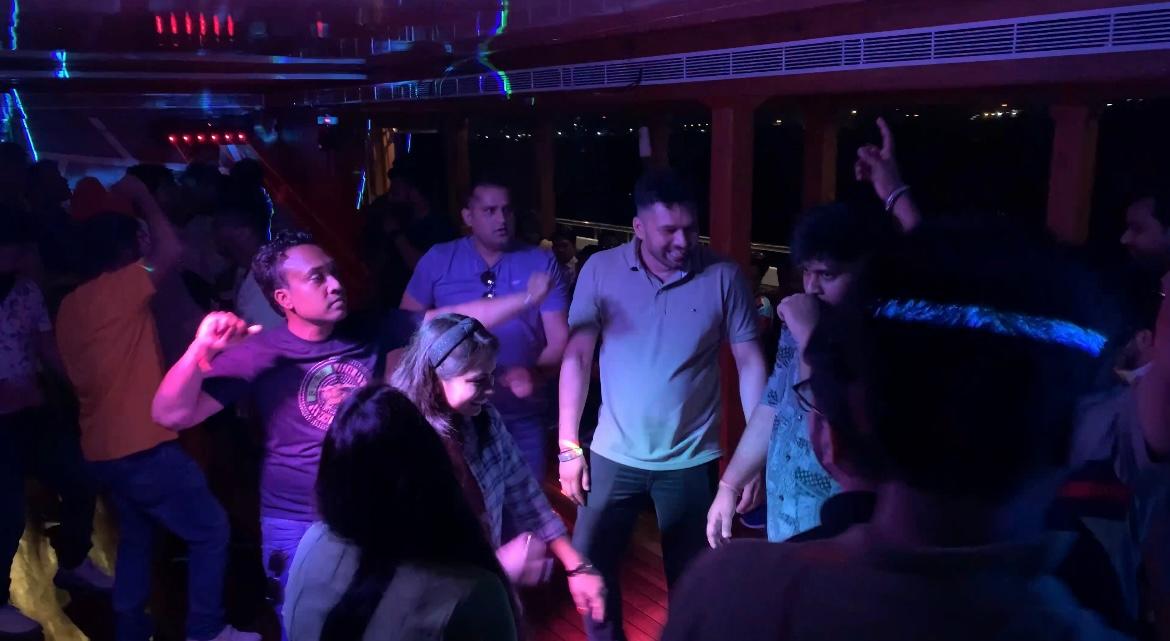 DJ party on Minar Cruise Illuminated dance floor and lively atmosphere aboard Kerala's premier catamaran in Kochi